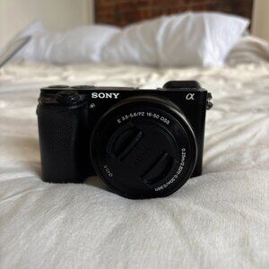 Sony A6000 24.3 MP Mirrorless Digital SLR Camera - Black (Issue with Lens)